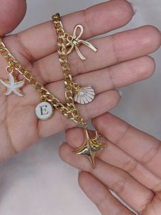 Create your own necklace | custom charm necklace | dainty pendants | gold charm neklace | charm necklace | vintage style chunky necklace Create your own necklace with charms, a unique way to transmit your emotions and vibes. 🐚HOW TO ORDER🐚 - Choose the style of your chain -Choose the number of charms - Write the charms you want 🐚MADE WITH LOVE🐚 This charm necklace is a perfect statement necklace for summer or a gift for a loved one! Perfect for birthdays, anniversaries, Mother's Day, bridesmaid gifts or friendship necklaces. 🐚CARE OF YOUR JEWELRY🐚 To keep it in good condition and extend the oxidation time of this jewel, I recommend avoiding sea water, perfumes, creams and daily use. Use it when you want to show it off, keep it stored outdoors since humidity can cause rapid rust. It i Trendy Gold Plated Charm Necklace For Gift, Gold Alloy Dangle Necklaces, Gold Dangle Necklaces In Alloy, Trendy Pendant Charm Necklaces As Gift For Her, Trendy Pendant Charm Necklaces For Her, Trendy Pendant Charm Necklace Gift For Her, Trendy Pendant Charm Necklace For Her, Trendy Pendant Jewelry With Dangling Charms, Trendy Gold-plated Charm Bracelet