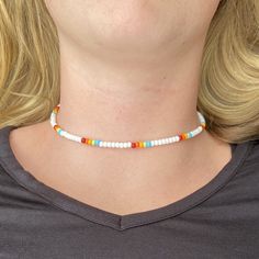 The Polaroid beaded choker is the perfect necklace for a day out in the sun. The classic Polaroid colors give a fun yet simple look for whatever the day may bring. All chokers are customizable to the size you need so please be sure to measure your neck where you want your choker to sit and order accordingly! This high quality beaded choker is beautiful worn on its own or layered. It is secured with a sterling silver lobster claw and made with glass beads that can stand the test of time, making i Seed Bead Choker Necklace, White Choker With Colorful Beads For Vacation, Beach Choker, Rainbow Choker, Diy Friendship Bracelets Tutorial, Trendy Chokers, Friendship Bracelets Tutorial, Colorful Necklace, Bead Choker