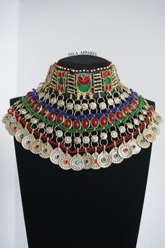 Afghan Jewellery Authentic Traditional Handmade choker. Get in contact with us if there is any queries regarding the item. Check out my page for other items. Help my small business and promote Afghan culture by placing an order with us. We have different kinds and types of Afghan Vintage Jewelleries! Your feedback is much appreciated. Please let us know the item arrived safely! Ceremonial Multicolor Metal Jewelry, Adjustable Multicolor Ceremonial Jewelry, Adjustable Multicolor Necklace For Ceremonial Occasions, Bohemian Multicolor Tilla Choker, Multicolor Unique Jewelry For Ceremonial Occasions, Adjustable Multicolor Jewelry For Ceremonial Occasion, Traditional Metal Jewelry With Colorful Beads, Bohemian Metal Choker For Ceremonial Use, Traditional Multicolor Choker For Festival