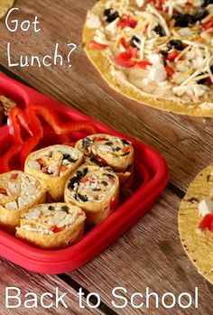 some food is in a red tray on a table with the words got lunch? back to school