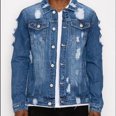 100% Cotton Imported Front Button Closure Button Chest Pockets Men's Distressed Denim Jacket Features Distressed Detail On The Front, Shoulders And Back. Distressed Design Makes The Jacket More Stylish And Eye-Catching. This Distressed Denim Jacket Goes Well With T-Shirt, Over A Hoodie And Joggers For A Laid-Back Look. Urban Ripped Denim Outerwear, Blue Denim Jacket With Buttons For Streetwear, Blue Denim Jacket For Streetwear, Blue Denim Jacket With Snap Buttons For Streetwear, Blue Urban Denim Jacket With Button Closure, Urban Blue Button-up Denim Jacket, Urban Style Medium Wash Button-up Denim Jacket, Blue Distressed Button-up Outerwear, Urban Style Medium Wash Denim Jacket With Button Closure