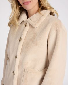 Clap back at the cold with class in this faux fur jacket! Relaxed shacket silhouette with a button-up front and two oversized pockets perfect for stashing essentials. | Faux Fur Jacket for Women by Love Token from Wantable Cozy Mink Outerwear With Faux Fur Lining, Cozy Mink-colored Outerwear With Faux Fur Lining, Cozy Long Sleeve Fur Coat With Pockets, Long Sleeve Mink Outerwear With Faux Fur Lining, Chic Oversized Fur Coat For Cold Weather, Oversized Chic Fur Coat For Cold Weather, Beige Fur Coat With Pockets For Cold Weather, Chic Faux Fur Coat With Pockets, Cozy Long Faux Fur Coat