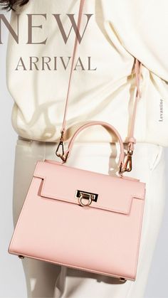 Upgrade your spring outfit with the Layla top handle bag in pink! This stunning accessory is the epitome of springtime elegance. Whether you're strolling through the park or enjoying a day of shopping, this bag will keep you looking stylish and sophisticated. Don't miss out on this season's must-have accessory! #SpringOutfit #FashionForward #PinkPerfection #StylingTips #SatchelStyle #CrossbodyChic Chic Travel Flap Bag With Adjustable Handle, Feminine Rectangular Bag For On-the-go, Spring Evening Shoulder Bag, Luxury Spring Bags For On-the-go, Feminine Evening Bag With Top Carry Handle, Pink Double Handle Bags For Daily Use, Pink Handheld Bag With Adjustable Strap, Spring Evening Satchel Shoulder Bag, Spring Satchel With Detachable Strap For Daily Use