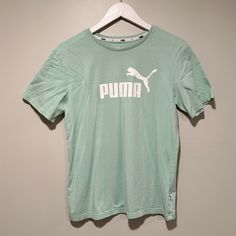 New Without Tags Mint Green Puma Logo T-Shirt. Size Small. 100% Cotton. Approx. Measurements (Laying Flat): Length (Shoulder To Hem): 24.5” Pit To Pit: 18” Comes From A Smoke Free, Cat Friendly Home. Please Ask All Questions About An Item Before Making An Offer. Offers Are Welcome! Bundle For The Best Deal! Thanks For Checking Out My Closet! Puma Shirts, Puma Tshirt, Puma Logo, Nike Air Max Tn, Free Cat, Puma Women, Boyfriend T Shirt, Cat Friendly, Blue T