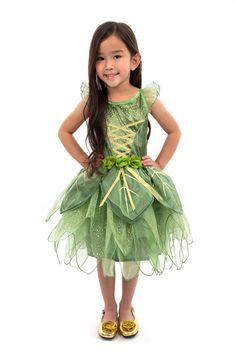 PRICES MAY VARY. This Pixie Tinkerbell costume is a delightful ensemble in enchanting green shades of green. Forest green stretch velvet bodice that is adorned with sparkles, mimicking the magical glow of pixie dust. The skirt flows with a whimsical and fluttering quality, capturing the essence of a playful spirit. Delicate green flowers and golden ribbons accents. (Matching doll clothes, wings, wands, halos, and other accessories sold separately). Machine washable! Made for everyday play and ad Tinkerbell Costume, Tinker Bell Costume, Baby Costumes Girl, Queen Dresses, Up Costume, Princess Theme Party, Hallowen Costume, Princess Dress Up, Green Shades