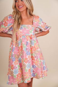 Feel as pretty as a flower in our Amelia Floral Dress. This mini dress features short, puff sleeves and a beautiful floral print. With a cute smocked design and mini ruffle detail, it's perfect for a casual yet lovely look. Fully Lined 100% Polyester Washing Instructions: Dry clean for best results Sunday Dresses, Spring Teacher Outfits, Casual Preppy Outfits, Cute Spring Outfits, Spread Kindness, Cute Summer Dresses, Dress Gift, Puffy Sleeves, Really Cute Outfits