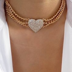 Attached layers, includes everything pictured Material: gold plated brass, crystals Length: 13" + 3" extension Pendant size: 1.1" x 1" IMPORTED Luxury Heart Shaped Necklace With Heart Beads, Gold Double Heart Crystal Jewelry, Adjustable Gold Heart Choker Necklace, Gold Crystal Heart Necklace, Valentine's Day Gold Rhinestone Jewelry, Gold Heart Pendant Necklace With Rhinestones, Heart Choker, Crystal Heart, Choker