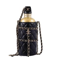 CHANEL Lambskin Quilted CC Water Bottle Black Gold – JaneFinds Chanel Water Bottle, Water Bottle Black, Chanel Chain, Signature Quilts, Gold Bag, Leather Thread, The Fashion Industry, Bottle Bag, Chic Accessories