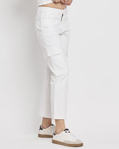 Elevate your casual style with our Dani High Rise Cargo Straight Leg Jeans in White. These jeans offer the perfect blend of comfort and chic, featuring a high-rise waist and a cropped length. The cargo design adds a trendy touch, making these jeans a versatile addition to your wardrobe. Product Details: Comfort stretch denim High-rise waist Cropped length Cargo straight leg style Imported Size & Fit (Based on Size 26): Rise: 10” Inseam: 27 1/4” Leg Opening: 16" Model is 5'9" and wearing a size 2 Chic Cropped Jeans With Pockets, Spring Cargo Jeans With Relaxed Fit And Cropped Leg, Spring Utility Cargo Jeans With Cropped Leg, Spring Cropped Leg Cargo Jeans With Relaxed Fit, Spring Relaxed Fit Cropped Cargo Jeans, Spring Cropped Leg Relaxed Fit Cargo Jeans, Casual Cropped Bottoms With Cargo Pockets, Spring Versatile Cargo Pants With Cropped Leg, Versatile Cropped Cargo Pants For Spring