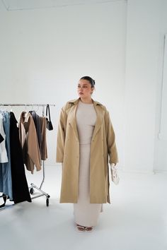 Looking for a go-to winter staple that exudes sophistication and style? Look no further than our new Lennox Trench Coat. More than just outerwear, this piece is a timeless addition to your forever wardrobe. Layer up underneath during the cooler months, or rock on its own over a cute mini dress and boots when the sun starts to come out. Why you'll love this: Timeless, versatile and functional - throw this coat on with literally anything and instantly look put-together Layer up: pair with Downtown Modern Everyday Fall Outerwear, Modern Everyday Outerwear For Fall, Classic Taupe Outerwear For Fall, Oversized Taupe Outerwear For Work, Classic Everyday Neutral Outerwear, Classic Neutral Outerwear For Everyday, Classic Neutral Everyday Outerwear, Classic Everyday Khaki Outerwear, Classic Khaki Outerwear For Everyday