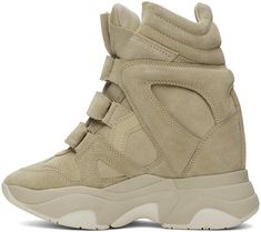 High-top suede sneakers in beige. · Perforated detailing at toe · Velcro straps at vamp · Logo flag at padded tongue · Quilted padded collar · Cutout at sides · Logo embossed at heel · Grained pigskin lining · Concealed wedge heel · Treaded platform rubber sole · Platform: H2 · Heel: H2 Supplier color: Beige Sporty Beige Suede High-top Sneakers, Beige Suede High-top Sneakers With Rubber Sole, Beige Suede High-top Sneakers With Round Toe, Beige Suede High-top Sneakers For Streetwear, Suede High-top Sneakers With Studded Rubber Outsoles, Isabel Marant Etoile, Pig Skin, Suede Sneakers, Velcro Straps