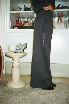 The new Essential Tracks are a chic take on the classic track pant, with a silhouette designed to flatter and with versatility. Designed with a low rise, statement elastic waistband, snug pockets and a wide leg silhouette. ⁠The Essential Tracks can be worn casually or can be elevated into a chic look. These sweatpants are detailed with metallic Charcoal embroidery below the right pocket, in our new Mode Mischief star artwork. Crafted with our heavyweight 370gsm fleece to keep you cozy & warm. fiord is a dark charcoal shade with blue undertones. MADE IN AUSTRALIA. 40% Cotton 60% Polyester All orders come with a complimentary cotton dust bag for safe storage of your fleece. Please store your fleece in the dustbag when not in use. HOW TO CARE FOR YOUR FLEECE: due to the nature of the fabric, Fitted Wide Leg Sweatpants For Streetwear, Mode Mischief, Star Artwork, Sweatpants Wide Leg, Wide Leg Track Pants, Low Rise Pants, Summer Graphic Tee, Track Pant, Safe Storage