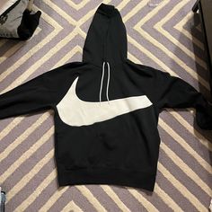 Nike Men’s Hoodie In Black And White. New Without Tags! Nike Long Sleeve Hoodie With Logo Print, Nike Athleisure Hoodie With Logo Print, Nike Crew Neck Hoodie With Logo Print, Nike Black Hoodie With Logo Print, Black Nike Hoodie With Logo Print, Nike Black Hoodie Sweatshirt, Nike Black Cotton Hoodie, Nike Black Sweatshirt With Logo Print, Shirts Nike