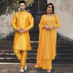 Menswear:- Art Silk Kurta in Yellow. This Readymade attire is Enhanced with Buttons. Crafted in Chinese Collar Neck and Full Sleeve. Available with an Art Silk Churidar in Yellow Do note: Footwear shown in the image is for presentation purposes only. Half to one inch may vary in measurement. (Slight variation in actual color vs. image is possible) Salwar Kameez:-Readymade Faux Georgette Pakistani Suit in Yellow. This attire with Cotton Lining is Enhanced with Resham and Sequins Work. Available w Silk Churidar, Purple Lehenga, Vs Image, Bridesmaid Lehenga, Angrakha Style, Pakistani Suit, Indian Party Wear, Chinese Collar, Silk Kurta