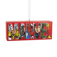 Relive the excitement of your favorite Marvel Super Hero adventures with this Christmas tree ornament that celebrates the rich comic book legacy. The red block design features the iconic Marvel Comics logo with characters in classic styling. One side spotlights heroes Thor, Captain America, Spider-Man, Black Widow, Hulk and Iron Man, while the other side features villains Loki, Red Skull, Venom, Hela, Thanos and Ultron. | Additional Details: Resin ornament is ready to hang on your Christmas tree Comics Logo, Heroes And Villains, Avengers Superheroes, Marvel Logo, Hallmark Christmas Ornaments, Red Skull, Hallmark Christmas, Logo Sign, Hallmark Ornaments