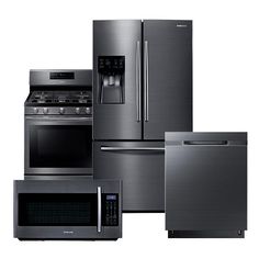 stainless steel appliances are stacked on top of each other, including an oven, refrigerator, microwave and dishwasher