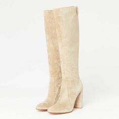 Elevate your style with these striking beige vegan suede knee high boots. Featuring a pointy toe, block heel, and back zipper for easy wear, they blend sophistication with comfort effortlessly. Color: Beige Material: Vegan suede Heel Type: Block heel Heel Height: 4.72" / 120 mm approx Product measurements were taken using size 8. Please note that measurements may vary by size. Toe: Pointed toe Back zipper design Buckle design Handcrafted US sizing. Fits true to size. Clear Heel Boots, Block Heel Knee High Boots, Suede Knee High Boots, Heel Knee High Boots, Cowboy Shoes, Kitten Heel Boots, Metallic Boots, Dance Heels, Thigh High Boots Heels