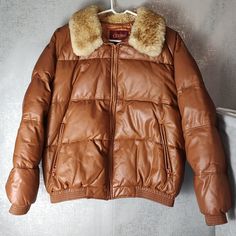 The Jacket Is In Great Condition With Wear/Scuffs From Age. There Is Also A Few Black Marks As Seen On Pics And The Jacket Gives Off A Certain Odor From Age I Assume. Size: Ml Material: Leather Pit To Pit: Approx 24" Length: Approx 28" Color: Brown Classic Quilted Leather Jacket For Winter, Retro Winter Outerwear With Padded Collar, Quilted Leather Jacket For Winter, Mens Jackets, Bomber Jacket, Jackets & Coats, Man Shop, Leather, How To Wear