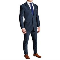 Buying a suit is an experience - our customers have had the most success by scheduling a consultation here with our sizing specialists. Our heathered navy stretch blazer is crafted from rayon, poly, and spandex blend that is extremely stretchy while still providing an incredibly professional appearance. They are lined with our dress shirt fabric making them lightweight, breathable and moisture-wicking. It also features our signature athletic fit that rewards those with an athletic physique. Fabr Custom Fit Notch Lapel Suits For Business Casual, Timeless Custom Fit Business Casual Suits, Timeless Business Casual Suits, Bespoke Tailored Suits For Semi-formal Occasions, Professional Custom Fit Semi-formal Suit, Semi-formal Custom Fit Notch Lapel Suits, Semi-formal Custom Fit Suits With Notch Lapel, Custom Fit Notch Lapel Suit For Semi-formal Occasions, Semi-formal Notch Lapel Custom Fit Suits