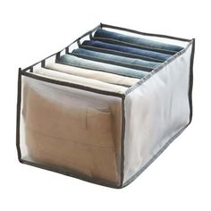 an open storage bag for folded clothes on a white background with clippings to the bottom