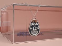 Unveil an aura of mystery and charm with our handcrafted Oval Skull Necklace - a treasure for the skull aficionado. Each piece is meticulously designed with a passion for the unique and the bold. This isn't just any accessory; it's a statement, a conversation starter, and a reflection of your daring spirit. Crafted from the finest materials, the necklace boasts a sturdy zinc alloy chain that promises durability and a radiant shine that captures the eye. The ellipse-shaped pendant cradles a white aluminum printing surface, awaiting the image that speaks to your soul. At the heart of this enchanting piece is solid brass - chosen for its timeless elegance and resilience, ensuring your necklace stands the test of time and trends. Measuring in perfect harmony with style and comfort, this neckla Skull Shaped Jewelry With Lobster Clasp For Gift, Handmade Skull Jewelry Gift, Handmade Skull Jewelry For Collectors, Handmade Skull Jewelry Collectible, Unique Skull Jewelry For Gift, Day Of The Dead Skull Jewelry Gift, Handmade Collectible Skull Jewelry, Halloween Teardrop Jewelry Gift, Necklace Stand