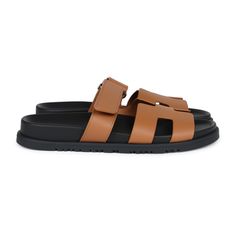 This pair of Chypre Techno sandals are in Naturel calfskin with black rubber soles and feature the iconic H and a velcro crossover strap.Origin: ItalyCondition: New and never wornAccompanied by: Hermes box, two shoe dustbags, ribbonSize: 38 EU Luxury Leather Slides With Tang Buckle, Luxury Calf Leather Slides With Removable Insole, Modern Calf Leather Slides With Rubber Sole, Luxury Double Strap Sandals With Tang Buckle, Luxury Double Strap Calf Leather Sandals, Luxury Sandals With Leather Sole And Double Strap, Luxury Sandals With Double Strap And Leather Sole, Luxury Sandals With Round Toe And Tang Buckle, Luxury Sandals With Double Strap And Branded Insole