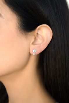 The Solitaire Drop Ear Jacket is a subtle statement-making addition to elevate your ear game and create unique looks. Handcrafted in solid 14 karat gold, this design can fit nicely with any of your studs and has four different adjustable lengths. Details: 14 Karat Gold Drop length: ~ 12.20 mm Diamond weight: approximately 0.16 ct Diamond Ear Jacket Earrings, Elegant Gold Diamond Earrings With Tension Setting, Elegant Formal Earrings With Tension Setting, Elegant Yellow Gold Diamond Earrings With Tension Setting, Formal Fine Jewelry Ear Climbers With Prong Setting, Formal Prong Setting Ear Climbers, Formal Prong-set Ear Climbers, Classic Diamond Ear Climbers For Anniversary, Elegant Wedding Diamond Earrings With Tension Setting