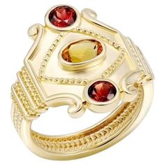 Gold 14K Ring Yellow (Same Model with Emerald Available) Citrine 1-0,51 ct Garnet 2-0,78 ct Weight 7.30 grams Size 6.5 US It is our honour to create fine jewelry, and it’s for that reason that we choose to only work with high-quality, enduring materials that can almost immediately turn into family heirlooms. From our selection of precious metals set with genuine precious stones, you can rest assured that NATKINA is jewelry for your everyday life, forever It is our honour to create fine jewelry, Gold Chic, Vintage Style Rings, 14k Gold Ring, Chic Vintage, Rings For Her, Vintage Chic, Cocktail Rings, Precious Metals, Vintage Stil