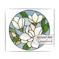 a stained glass window with white flowers on it