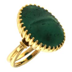 This classic 18K yellow gold ring showcases a striking green agate centerpiece, known for its rich color and natural allure. Crafted with precision, the gold band complements the vibrant hue of the agate stone, creating a statement piece of jewelry that radiates elegance. Total Ring Weight: 8.15 grams Green Agate Size: 16x21 mm US Size: 6.5 Ideal for those who appreciate the beauty of natural gemstones paired with fine gold, this ring adds a timeless elegance to any collection. Elegant Green Cabochon Emerald Ring, Elegant Green Emerald Cabochon Ring, Formal Green Cabochon Emerald Ring, Luxury Green Intaglio Rings, Classic Green Cabochon Emerald Ring, Green Emerald Cabochon Rings, Elegant Green Intaglio Ring, Formal Green Cabochon Rings, 18k Yellow Gold Ring