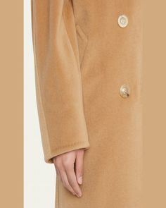 Maxmara "Madame" coat in wool cashmere blend. Notched lapel; double breasted button front. Long sleeves. Hip slip pockets. Trench fit. Virgin wool/cashmere. Lining, cupro/viscose/metallic fiber. Made in Italy. Beige Cashmere Outerwear With Button Closure, Classic Cashmere Wool Coat With Concealed Placket, Designer Wool Coat With Button Closure For Fall, Chic Cashmere Outerwear With Button Closure, Classic Single-breasted Cashmere Wool Coat, Classic Cashmere Wool Coat For Office, Luxury Beige Double-breasted Wool Coat, Designer Wool Long Pea Coat, Designer Long Wool Pea Coat