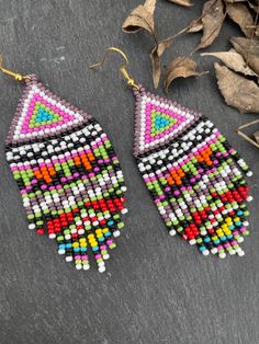 Bohemian Multicolor Beaded Chain Earrings, Colorful Tiny Beads Dangle Earrings, Multicolor Dangle Beaded Earrings, Multicolor Tiny Beads Dangle Earrings, Traditional Multicolor Beaded Chain Earrings, Multicolor Beaded Chain Earrings As Gift, Colorful Dangle Earrings With Tiny Beads, Traditional Multicolor Beaded Earrings With Beaded Chain, Multicolor Beaded Chain Earrings For Gift