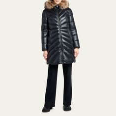 Moncler "Chandre" long puffer coat features a removable shearling trim at the hood  Hooded collar Two-way zip front  Long sleeves; logo patch at left  Front zip pockets  Mid-length  Relaxed fit  Item runs large, consider ordering a size down Nylon/polyamide Lining: Nylon Down/Feather fill Dry clean Imported Long Puffer Coat, Long Puffer, Down Feather, Puffer Coat, Mid Length, Patch Logo, Zip Pockets, Puffer, Tops Designs