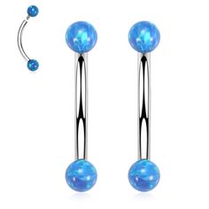 pair of surgical steel belly rings with blue opal balls