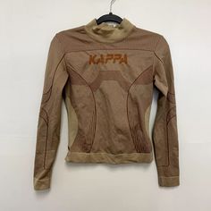 Kappa Authentic Jaworzno Logo Print Long Sleeve Tight Shirt Beige Brown Size M/L | eBay Fitted Crew Neck T-shirt In Khaki, Sporty Stretch Brown Tops, Sporty Brown Stretch Top, Fitted Beige T-shirt Crew Neck, Fitted Beige Crew Neck T-shirt, Sporty Brown Long Sleeve Tops, Beige Fitted Crew Neck T-shirt, Fitted Brown Crew Neck Top, Brown Long Sleeve Sporty Tops