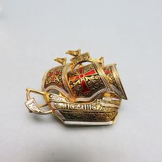 Spanish Damascene Galleon Brooch, Vintage, Small Size - Etsy Collectible Engraved Gold Brooches, Gold Engraved Collectible Brooches, Gold Engraved Brooches For Collectors, Ornate Gold Collectible Brooches, Collectible Gold Enamel Pins, Antique Gold Lapel Pin Collectible, Antique Gold Enamel Brooches, Antique Gold Enamel Pin Gift, Antique Style Gold Enamel Brooch Pin