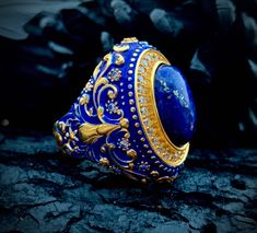 PRODUCT DETAILS OF Gold plated Lapis Lazuli Ring Baroque Ornate Ring Victorian Ring Rococo Men Ring Dark Blue Enamel Lapis Lazuli Gemstones 925 Sterling Silver Men Ring Vintage Style Jewelry Gift Silver Men Ring Natural stones ring, New year gift, Christmas gift * Made to Order * Certified 925 sterling silver * Gold plated  Lazuli Ring ring comes in a pretty ring box ready for gift giving.   Baroque Ornate Ring size *It is always safer to see a jeweler to have a more precise idea about your ring Luxury Men's Lapis Lazuli Jewelry, Luxury Oval Lapis Lazuli Rings, Luxury Lapis Lazuli Oval Rings, Luxury Lapis Lazuli Gemstone Rings, Luxury Lapis Lazuli Rings, Luxury Lapis Lazuli Jewelry, Luxury Sapphire Signet Ring As Gift, Exquisite Stone Setting Rings For Gift, Exquisite Rings With Stone Setting For Gifts