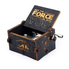 an open wooden box with the words may the force be with you on it