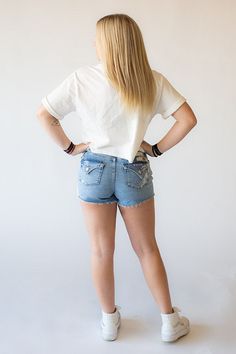 These high rise denim shorts are adorable and just in time for summer! They are uniquely bleached and splattered– every one is slightly different from the next. Pair with our Short Sleeve Crop Top. 93% cotton, 6% elasterell, 1% elastaneCare instructions: machine wash cold, tumble dry low