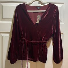 J Crew Viscose Blend Velvet Blouse! New With Tags! Size: 10 Color: Burgundy Lined. Side Zipper. Tie Waist That May Also Be Removed. V Neck. New With Tags Never Worn! Excellent Condition. Absolute Stunner. Timeless Wardrobe Stable. Chic Burgundy V-neck Blouse, Red V-neck Blouse For Fall, Long Sleeve V-neck Top For Fall Party, Fall Party Long Sleeve V-neck Top, Burgundy V-neck Top For Date Night, Fall V-neck Top For Date Night, Burgundy V-neck Top For Winter, Elegant V-neck Winter Blouse, Elegant V-neck Blouse For Winter