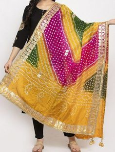 Color :- Multi Colour Size:- Length : 2.5 Meters Width : 44 Inches Material: Thread, Silk `Colour & Design/Pattern  --> As Shown in picture.   *NOTE--              --> "The images are as accurate as possible. However, may vary due to  lightning, flash light while photo shoot and according to screen settings and resolution" *SHIPPING INFORMATION -->  {The package will be shipped within 2 Business Days once the order                                                       paid and provide the tracki Yellow Bandhani Print Traditional Wear, Multicolor Bandhani Traditional Wear For Celebration, Multicolor Bandhani Print Traditional Wear For Diwali, Multicolor Bandhani Print Traditional Wear For Celebration, Multicolor Traditional Wear With Bandhani Print For Celebration, Multicolor Semi-stitched Traditional Wear For Festival, Bohemian Multicolor Saree With Gota Work, Semi-stitched Multicolor Traditional Wear For Festivals, Multicolor Festival Dupatta With Pallu