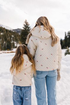 Expertly crafted and elegantly designed, our Mini Quilted Jacket in Delicate Zinnia boasts a cream base color adorned with a pink zinnia floral print. Featuring intricate quilt embroidery and the coziest fit. Details include a detachable hood, elastic ruched cuffs and functional pockets. This darling puffer coat offers both style and functionality, perfect for your little gal. Intricate Quilt, Pink Zinnia, Quilt Embroidery, Ivy City Co, Winter Fashion Coats, Cream Base, Floral Jacket, Fit Details, Mini Quilt