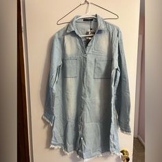 Soft Denim Tunic Length Distressed Shirt. Never Worn. Tags Attached Casual Medium Wash Denim Top With Frayed Hem, Cotton Denim Button-up Top With Frayed Hem, Cotton Denim Top With Frayed Hem, Cotton Denim Top With Frayed Hem And Button-up, Blue Long Sleeve Denim Top With Frayed Hem, Cotton Denim Top With Frayed Hem And Long Sleeves, Long Sleeve Cotton Denim Top With Frayed Hem, Long Sleeve Denim Top With Frayed Hem, Medium Wash Long Sleeve Denim Dress With Frayed Hem