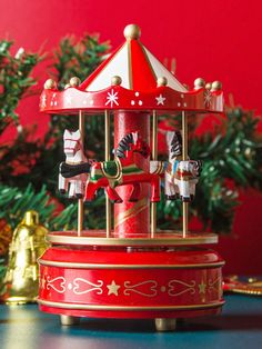 a merry go round toy sitting on top of a table