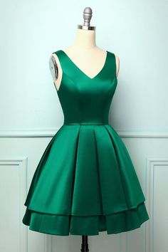 Homecoming Dresses Green Short, Elegant Green A-line Satin Dress, Green A-line Mini Dress For Prom Season, Green A-line Mini Dress For Prom, Satin Ball Gown For Parties, Green Satin A-line Dress, Formal Dark Green V-neck Dress, Green V-neck Bridesmaid Evening Dress, Green Satin Finish Bridesmaid Dress