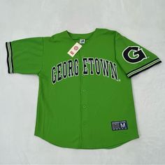 Vintage Y2k Georgetown Hoyas #3 Green Ncaa College Baseball Jersey Men’s Size M Brand New With Tags Never Worn In Excellent Condition. Vintage Late 90s Early 2000s. Made By Bex. Georgetown Hoyas Ncaa Baseball Jersey Men’s Size Medium. Green & Black With White Colors. Screen Printed Lettering And Logos. Deadstock Rare Hard To Find Please See All Pictures For Details Casual Green Baseball Jersey For College, Cotton Baseball Jersey For Streetwear, Casual Baseball Jersey For Fans, Casual Baseball Jersey With Logo Print And Crew Neck, Casual Green Baseball Jersey For Sports Events, Casual Baseball Jersey With Logo Print, Casual Crew Neck Baseball Jersey With Logo Print, Green Baseball Jersey For Sports With Crew Neck, Cotton Baseball Jersey With Team Logo For Streetwear