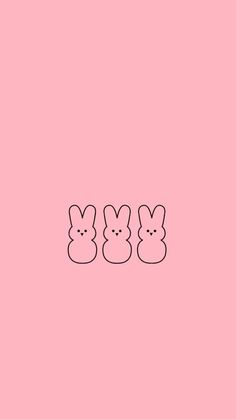 three bunny ears are in the middle of a pink background with black outline on it