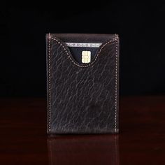 Minimalism at its best in this unique front pocket wallet for credit cards and cash. Brown Bifold Card Holder With Rfid Blocking, Classic Brown Card Holder With Coin Pocket, Modern Brown Card Holder With Card Slots, Brown Trifold Wallet With Card Slots For Business, Brown Business Trifold Wallet With Card Slots, Modern Rectangular Card Holder With Coin Pocket, Modern Brown Wallets With Rfid Blocking, Rectangular Trifold Wallet With Rfid Blocking, Modern Trifold Card Holder With Coin Pocket