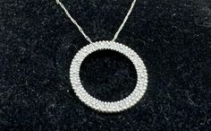 3/4" inches circle of life diamond pendant 10k white gold with necklace 20" inches long. Circle Of Life, Diamond Pendant, Jewelry Necklace Pendant, White Gold, Jewelry Necklaces, Pendant Necklace, Pendant, Gold