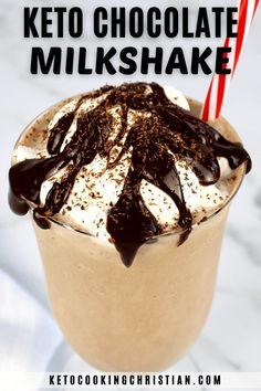 a chocolate milkshake with whipped cream and chocolate drizzle on top